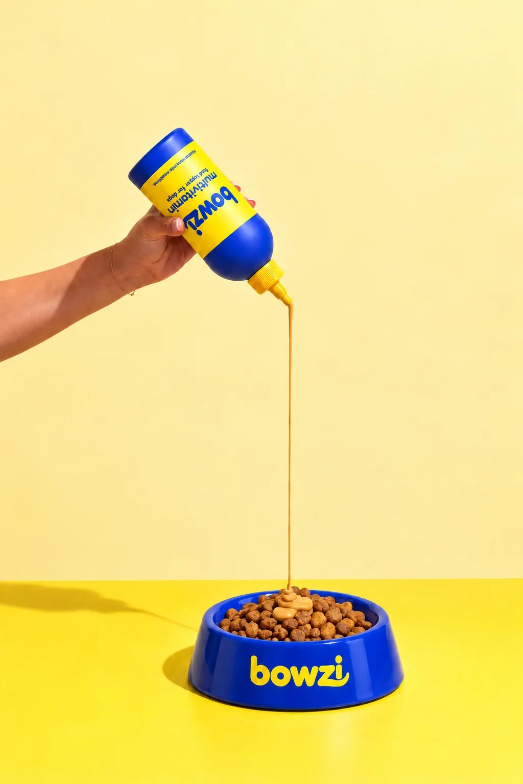 Bowzi being poured into a dog bowl